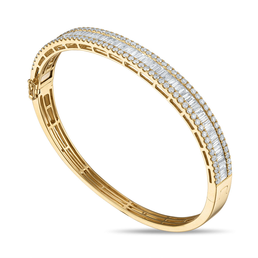 Baguette and pave outline diamond bangle in yellow gold