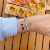 Queen of Hearts Solid Gold Bangle on Wrist