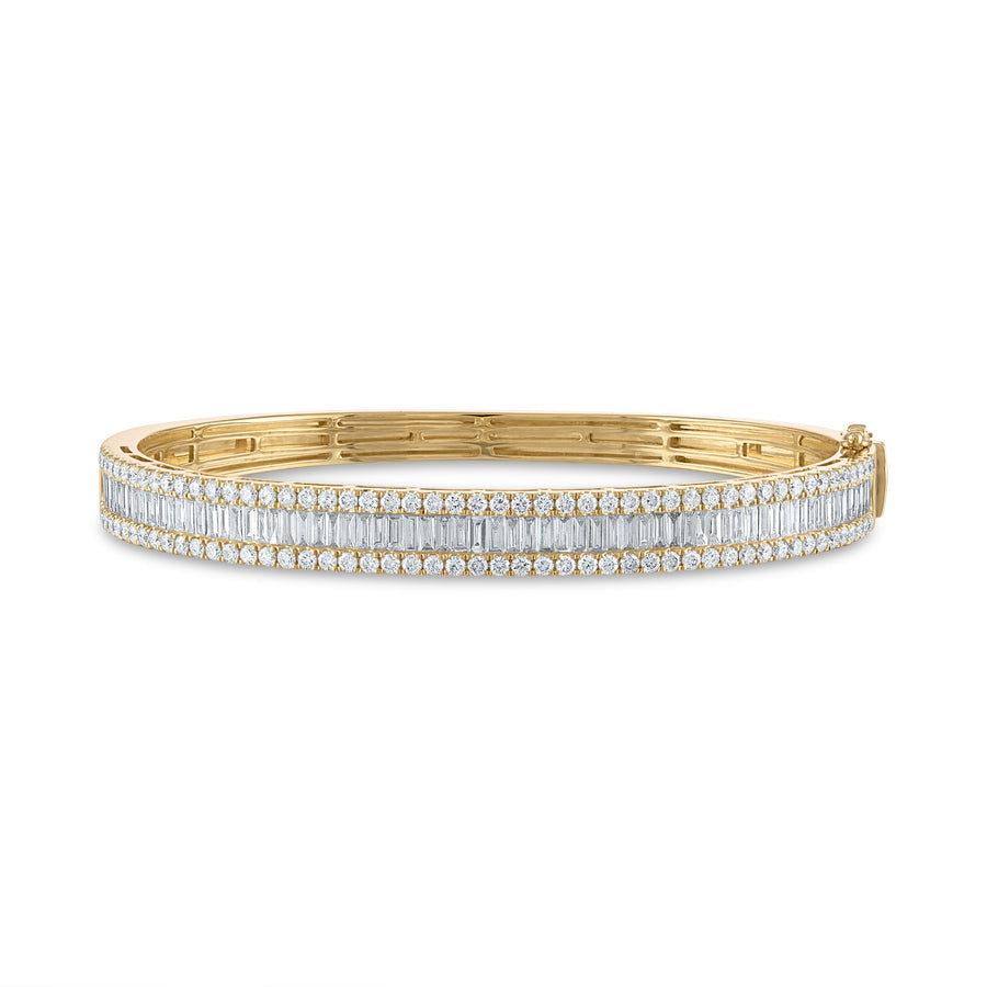 Baguette and pave outline diamond bangle in yellow gold